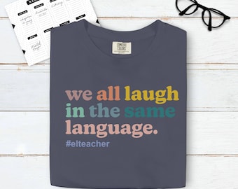 Comfort Colors EL Teacher Navy Blue Shirt. We All Laugh in the Same Language. English Learner Educator Inspirational Saying TShirt