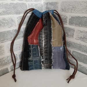 Handgemachte kleine Geldbörse aus vintage Boro Jeans-Patches, lässige Geldbörse mit Kordelzug