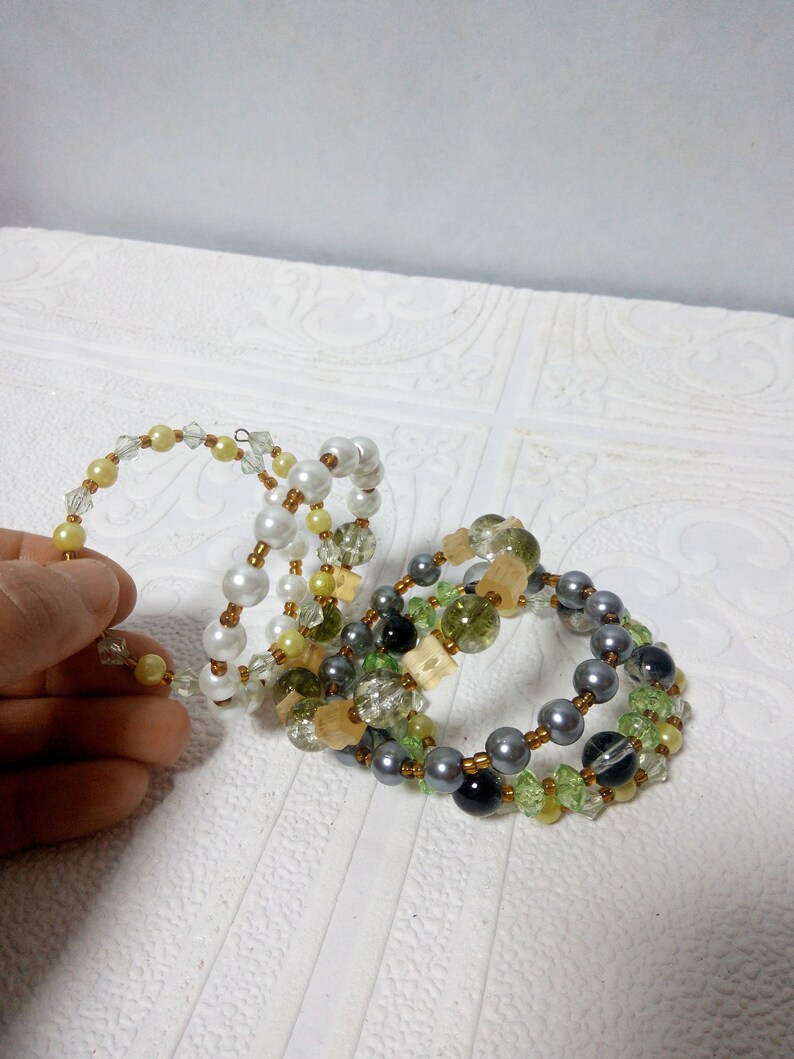 Spiral boho multi-row bracelet for hippies festival and beach party on a wire with a memory of beads and crystals Trend summer 2019