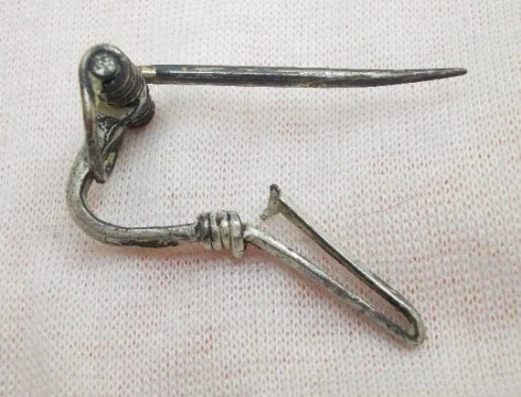 Ancient brooch deals