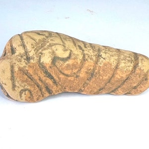 An ancient figurine of the archaeological culture of Trypillia-Cucuteni, the Eneolithic period. 5th-4th millennium BC e.