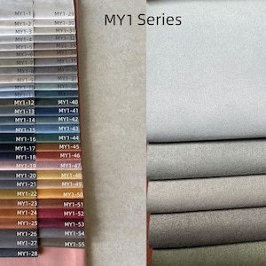 May include: A color swatch featuring a variety of fabric samples in shades of gray, blue, brown, and red. The samples are labeled with the "MY1 Series" and individual codes. The fabric appears to be a soft, textured material.