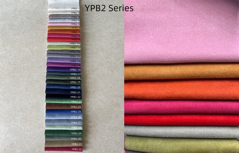 May include: A fabric swatch display featuring the "YPB2 Series" with a variety of colors. The display includes a spectrum of hues, from light pink and orange to deep blues and greens. The text "YPB2 Series" is visible.