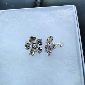 HMN Silver tone flower with rhinestones clip on earrings
