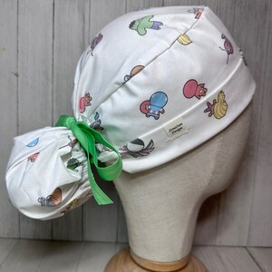 Superhero Baby Friends Ponytail Scrub Cap: Women's Comic Surgical OR Hat, Animated Kid Friends Doctor Nurse Medical Pediatric CRNA PA Chef