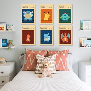 May include: Six vintage-style posters featuring Pokemon characters. The posters are in a grid formation on a white wall. The characters are Blastoise, Pikachu, Ivysaur, Charmander, Wartortle, and Charizard.