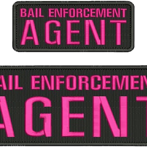 May include: Two black rectangular patches with pink embroidered text. The top patch reads "BAIL ENFORCEMENT AGENT". The bottom patch reads "BAIL ENFORCEMENT AGENT".