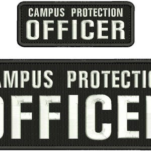 May include: Two black embroidered patches with white text. The larger patch reads "CAMPUS PROTECTION OFFICER" in a bold, sans-serif font. A smaller patch above repeats the same text. The patches are rectangular.