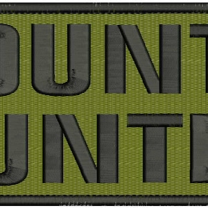 May include: A green and black embroidered patch with the text "BOUNTY HUNTER" in black.