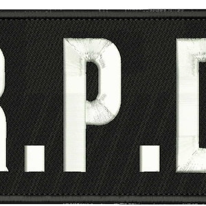 May include: Black patch with white embroidered letters that spell out "R.P.D."