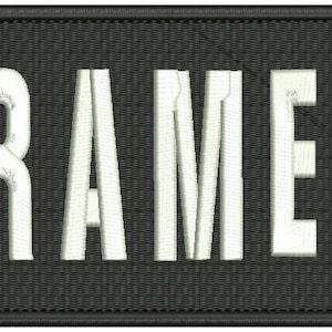 May include: Black embroidered patch with white text that reads "PARAMEDIC".