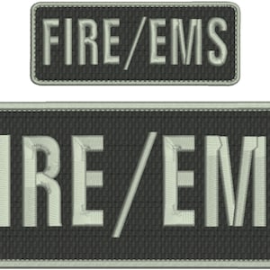 May include: Two black and white embroidered patches with the text "FIRE/EMS" in white.