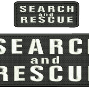 May include: Two black and white embroidered patches with the text "SEARCH and RESCUE" in white lettering.