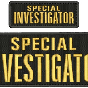 May include: Two black embroidered patches with gold lettering that reads "SPECIAL INVESTIGATOR".