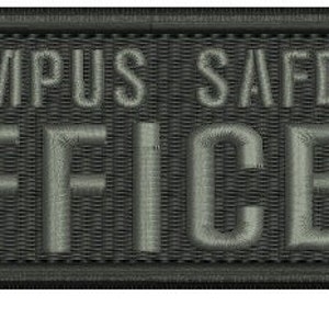 May include: Black embroidered patch with white text that reads "Campus Safety Officer".