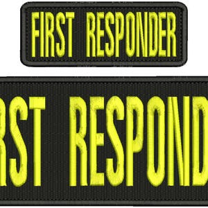 May include: Two black patches with yellow embroidered text that reads "FIRST RESPONDER". The top patch is smaller than the bottom patch.