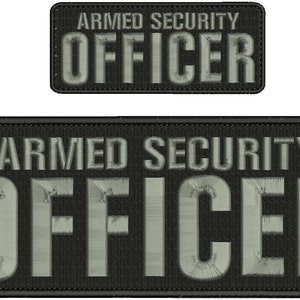 May include: Two black patches with white text that reads "ARMED SECURITY OFFICER". The patches are made of a textured fabric.