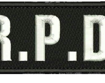 R.P.D. Embroidery Patch 2x5 inches Hook backing White letters