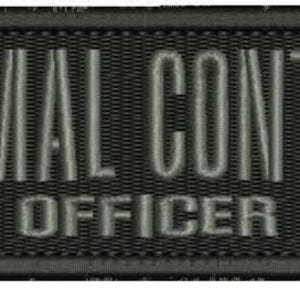 May include: A rectangular black embroidered patch with a stitched border. The text ANIMAL CONTROL is embroidered in a grey sans-serif font on the top line, with the word OFFICER embroidered in the same grey font on the line below.