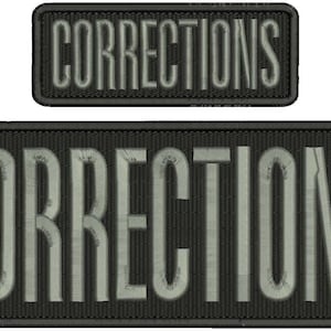 May include: Two black patches with white text that reads "Corrections".