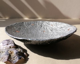 Unique silver recycled paper bowl with a gold spots. Decorative paper mache plate for a sophisticated interior. A small jewelry bowl.