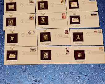 Estate lot of 22kt gold replica stamps first day of issue