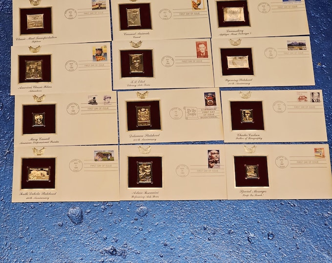 Estate lot of 22kt gold replica stamps first day of issue