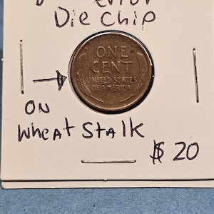 May include: A rustic wooden sign with the text "Welcome to our home" in white lettering. The sign features a distressed finish and a simple, inviting design, perfect for entryway decor.