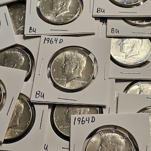 1964 D Kennedy Brilliant Uncirculated Silver Half Dollar.