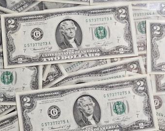 One Uncirculated Series 1976 2 Dollar Green note printed in Chicago Illinois