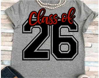 May include: Gray t-shirt with a black and white graphic that says "Class of 26" in red.