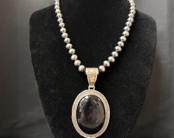 PY, Navajo, Large Onyx Pendant in Sterling Silver with Stamped Details