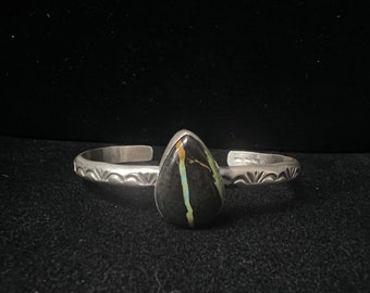 Navajo, Blackjack Turquoise and Sterling Silver Cuff with Stamped Decoration and Brushed Finish