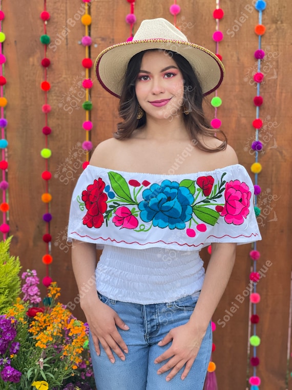 white mexican shirt with flowers