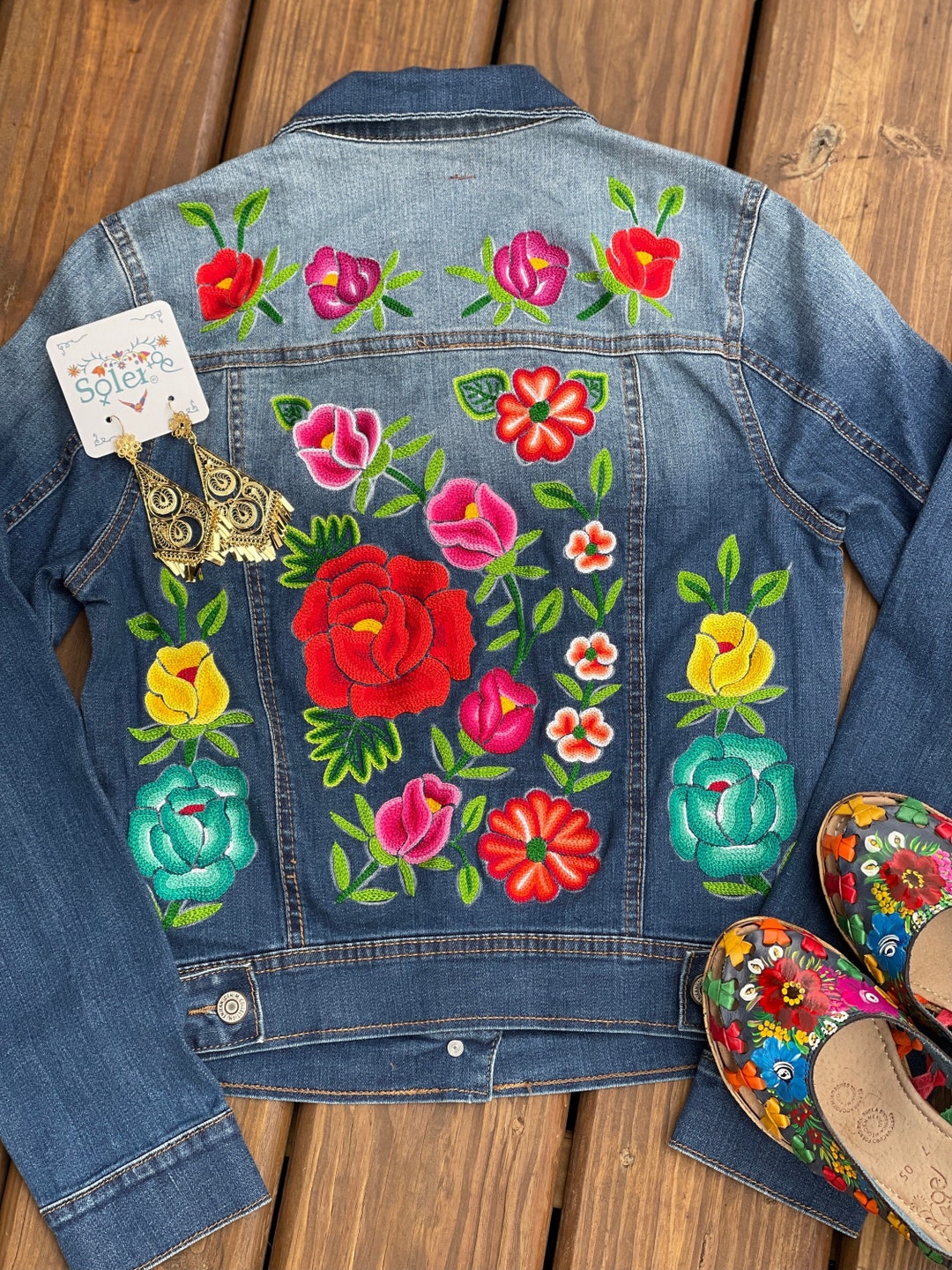 A Wayuu Family's Journey of Needle Punch Patch on a Denim Jacket