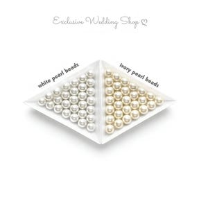 May include: An image of white and ivory pearl beads arranged in a diamond shape. The text "Exclusive Wedding Shop" is at the top. The white pearls are labeled "white pearl beads" and the ivory pearls are labeled "ivory pearl beads".