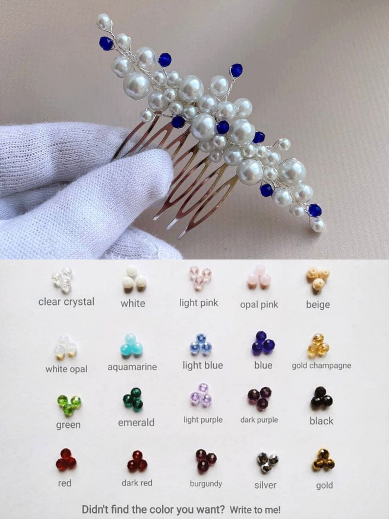 May include: A bridal hair comb featuring white faux pearls and blue crystal accents. The comb is made of silver-toned metal and has multiple tines. A color chart with various crystal colors is also shown.