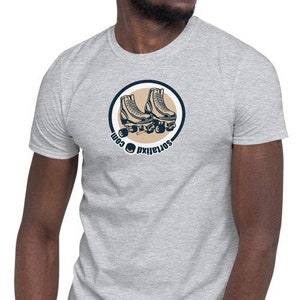May include: A gray t-shirt with a vintage-style graphic of a pair of roller skates in a circle. The text "SoulSkating Co." is written around the circle.