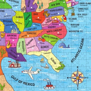 May include: A colorful map of the United States with each state outlined in a different color. The map includes state names, major cities, and small illustrations of landmarks and animals. The map is surrounded by a blue ocean with a compass rose in the bottom right corner.