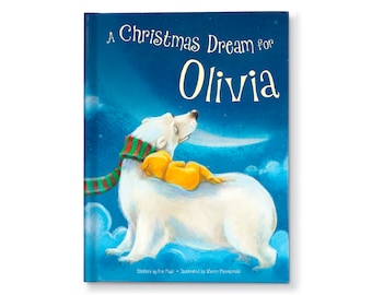 May include: A blue book cover with a white polar bear wearing a red and green scarf and a yellow puppy sleeping on its back. The book title is "A Christmas Dream for Olivia".