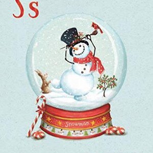 May include: A snow globe with a snowman inside, wearing a black top hat and a red scarf. The snowman is holding a red cardinal in its hand. The snow globe is on a red and white base with the word "Snowman" written on it. There is a candy cane on the left side of the snow globe.