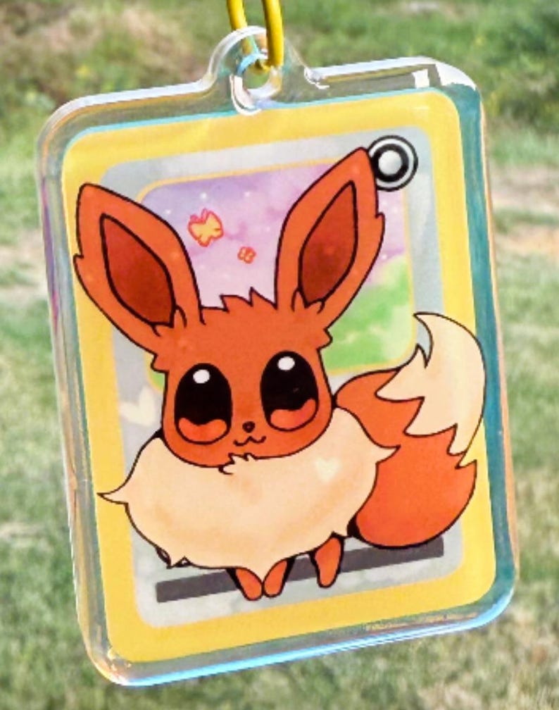 Holographic Eeveelution acrylic keychains