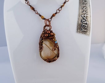 Copper and brass wire wrapped pendant with creamy yellow citrine stone
