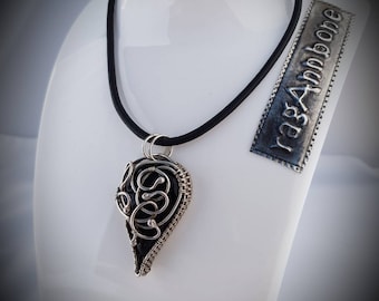 Sterling silver wire wrapped pendant necklace with black onyx stone