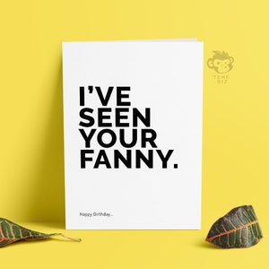 May include: A white card with black text that reads "I've seen your fanny."  The card also has the text "Happy Birthday..." at the bottom.