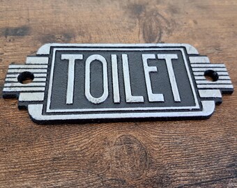 Cast metal 'TOILET' sign with mounting holes, Wall hanging