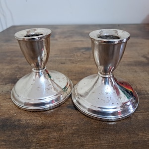 Par ljusstakar i sterlingsilver med vikt från Duchin Creation