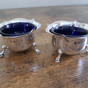 Two matching antique hallmarked Birmingham silver salt dishes, dated 1913, Blue liners, Pair of silver salts