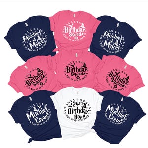 May include: Set of ten t-shirts in pink, white, and navy blue with black and white text and graphics. The shirts feature the text "Birthday Squad", "Mischief Maker", "Mischief Crew", and "24th Birthday Boy".