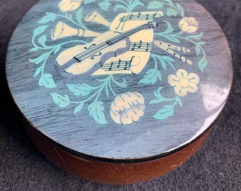 Caja de música vintage de madera con incrustaciones redondas de Sorrento